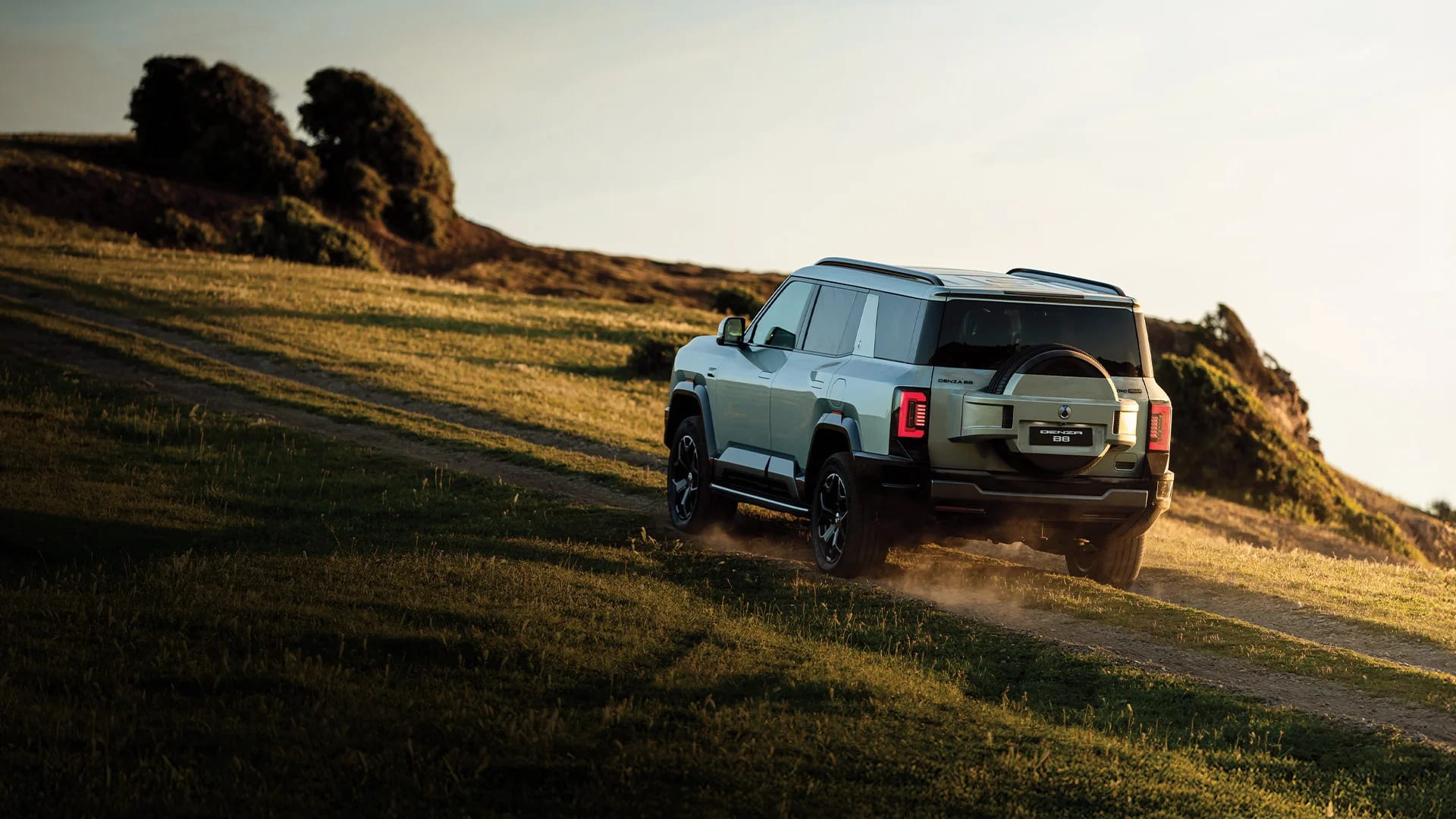DENZA B8 complete rear three-quarter exterior in an outdoor landscape | CHINA EV SOURCE