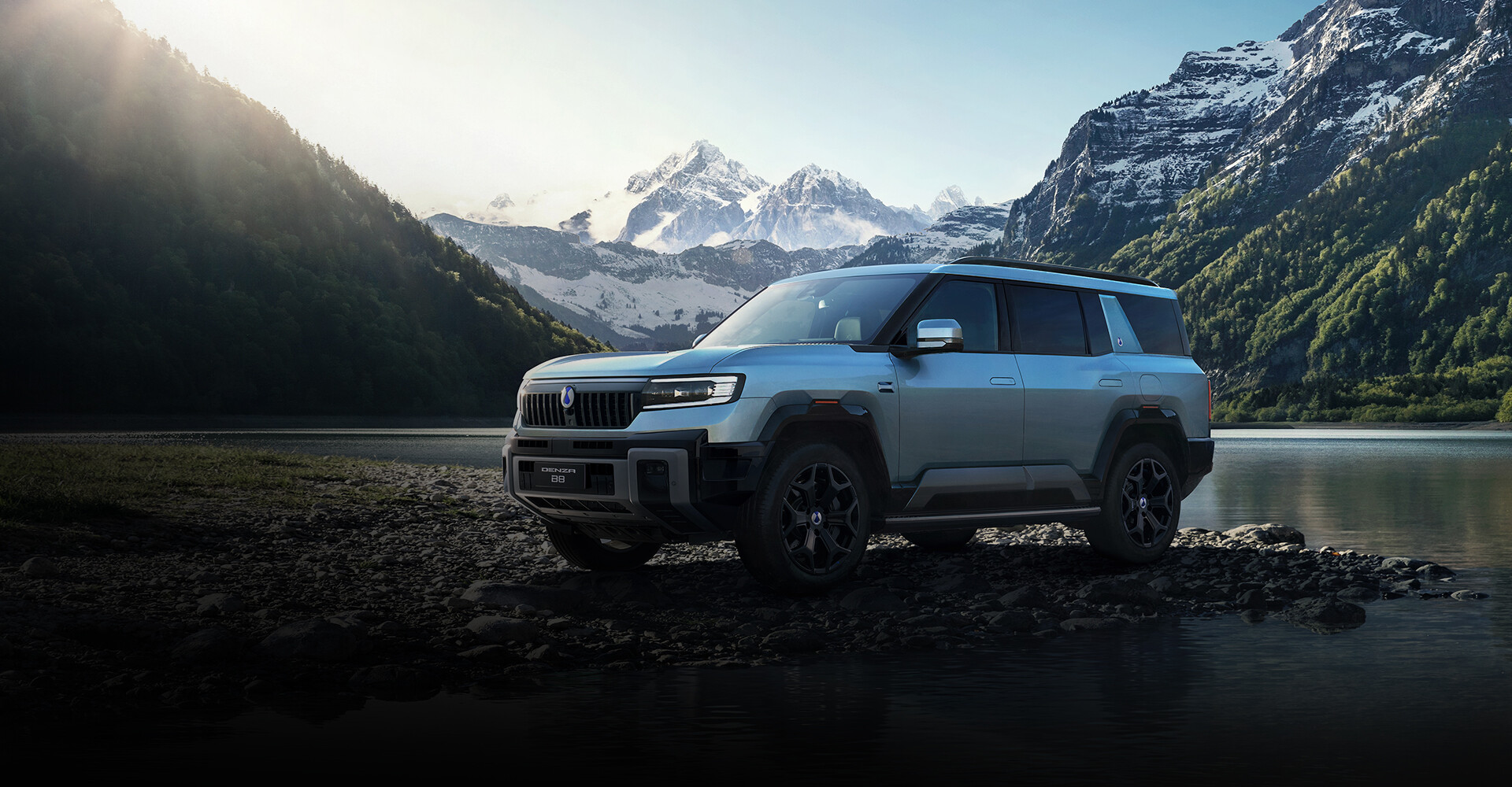 DENZA B8 complete front three-quarter exterior beside a mountain lake — official RHD-market model image | CHINA EV SOURCE