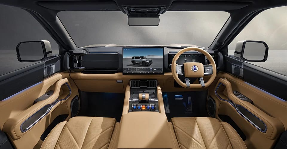 DENZA B8 brown luxury interior with right-hand-drive steering wheel and full dashboard visible | CHINA EV SOURCE
